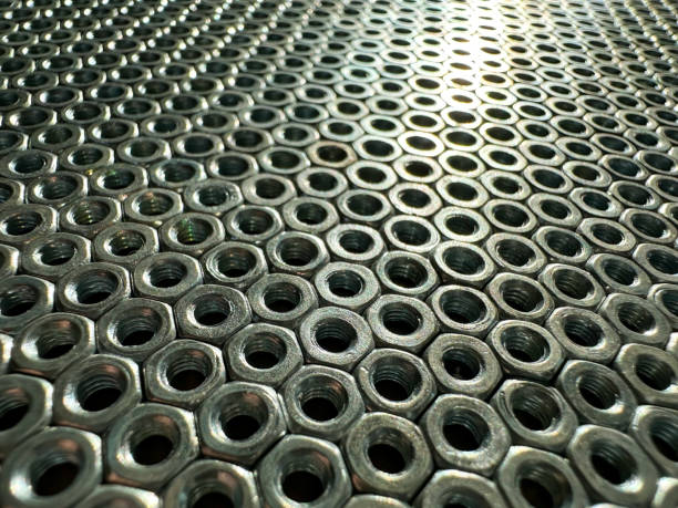 istock Nuts for bolts lie next to each other 2091704432