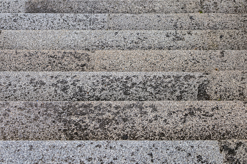 Background image formed by granite rocks on some stairs