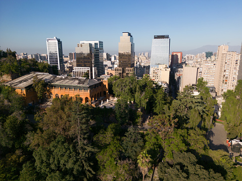 aerial view of Santiago high-rise buildings with Santa Lucía Hill in Santiago, Chile, in the foreground