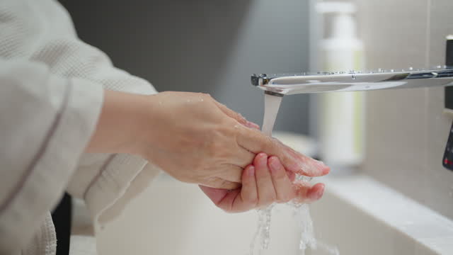 Woman Cleaning Her Hands