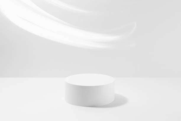 istock One round white pedestal mockup for cosmetic products, smooth neon light stripes on white background. Scene for presentation skin care products, gifts, advertising, sale, showing in elegant style. 2091816196