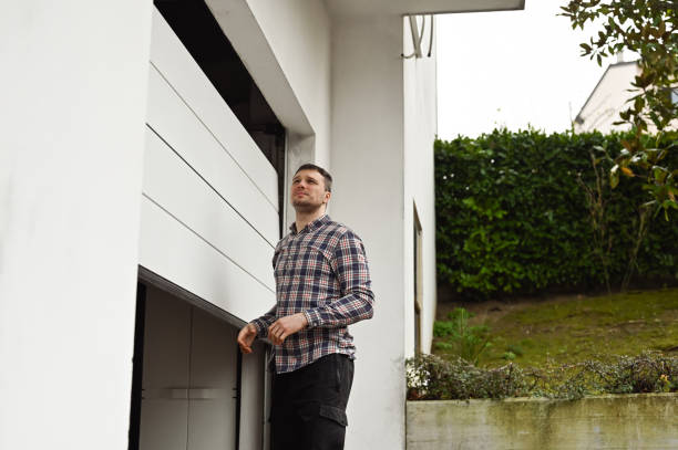 istock Portrait of a handsome man expertise garage automatic door. 2091834047