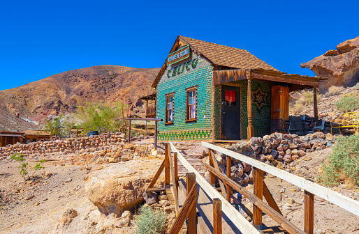 Calico Ghost Town,  California, United States - October 6, 2023: green bottle house
