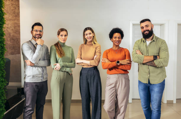 istock Successful group of business people at modern office looking at camera. 2091848052