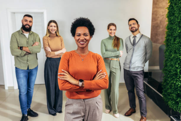 istock Successful group of business people at modern office looking at camera. 2091848568