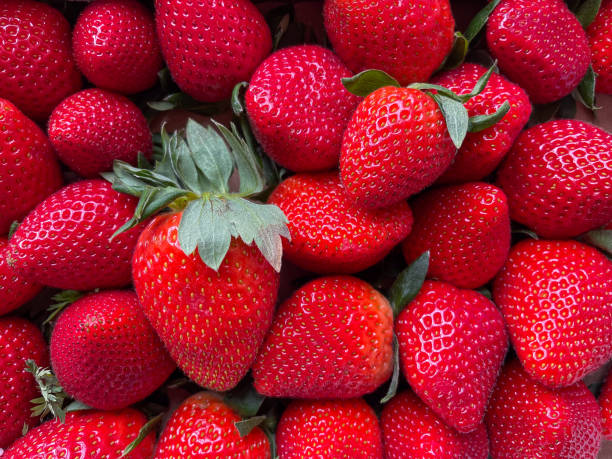 istock fresh strawberries on a market 2091877790