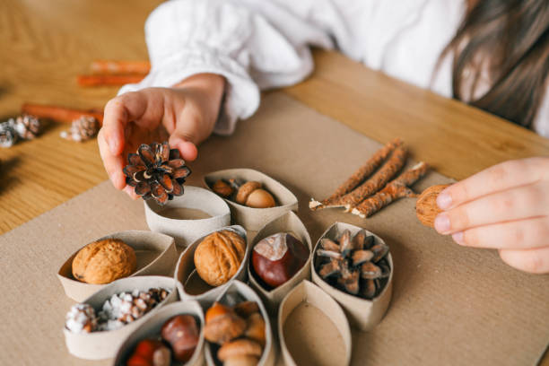 istock Montessori and Sensory Development, A child plays with natural materials 2091892438