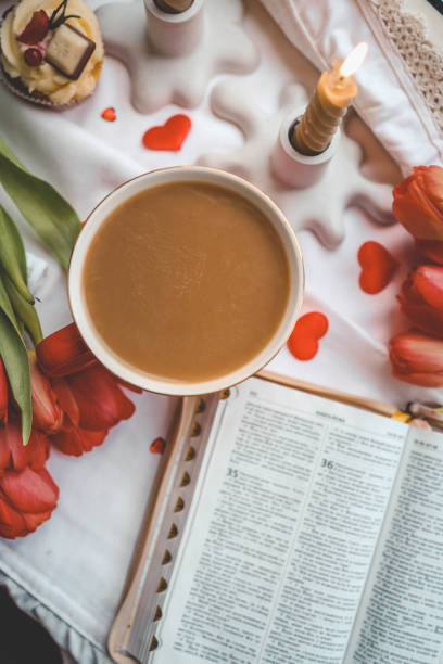 istock Open bible in home morning interior 2091893490