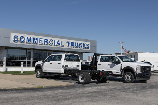 Greenwood - March 16, 2024: Ford Truck and Commercial Trucks dealership. Ford trucks include the F-250, F-350, F-450, F-550, F-650, F-600, and F-750.