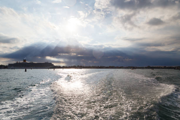 Venice, Italy - October, 6 2019: Luxury cruise ship Costa Deliziosa sails in Venetian lagoon.