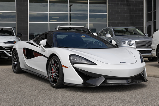Indianapolis - March 16, 2024: McLaren 570S display with a 3.8L V8 Twin Turbocharged engine. McLaren offers the 570S with a 7-Speed transmission. MY:2018