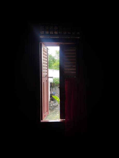 istock portrait of an open window as morning light streams in 2091962523