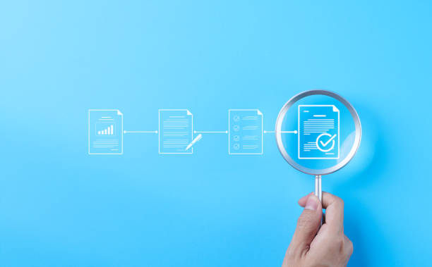 istock Document review process and quality control concept. Hand holding magnifying glass over a document icon with checklist, Document review and approval. Certificate management, Audit, Standardization, 2091968852