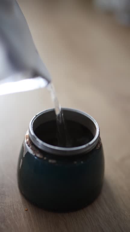 brewing coffee in a moka pot