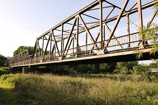 Juni 17, 2022, Menden: Old railway bridge over the river Ruhr near Menden in the Sauerland region