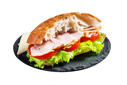 Fresh and healthy turkey sandwich with white cheese, tomato and Lettuce in white bread.  Isolated on white background. Top view