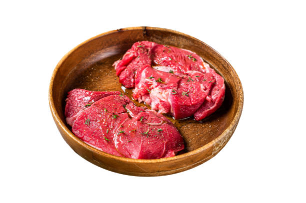 istock Fresh Mutton chop leg steaks, uncooked lamb meat with herbs.  Isolated on white background. Top view. 2092047207