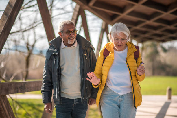 istock Active Senior Couple Walking Together Outdoors 2092134506