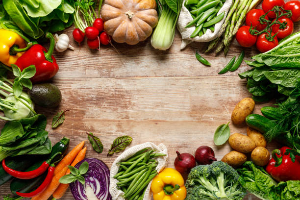 istock Vegetables background. Various vegetables on kitchen table. Clean eating, healthy food concept, flat lay, top down view 2092178473