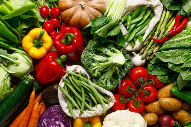 istock Vegetables background. Various vegetables on kitchen table. Clean eating, healthy food concept, flat lay, top down view 2092178474