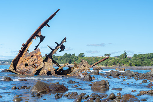 Shipwrecked remains of bow of Gairloch on south end Oakura beach New Plymouth.
