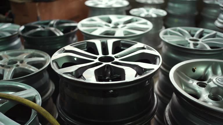 closeup of car alloy wheel in tire store or warehouse stock