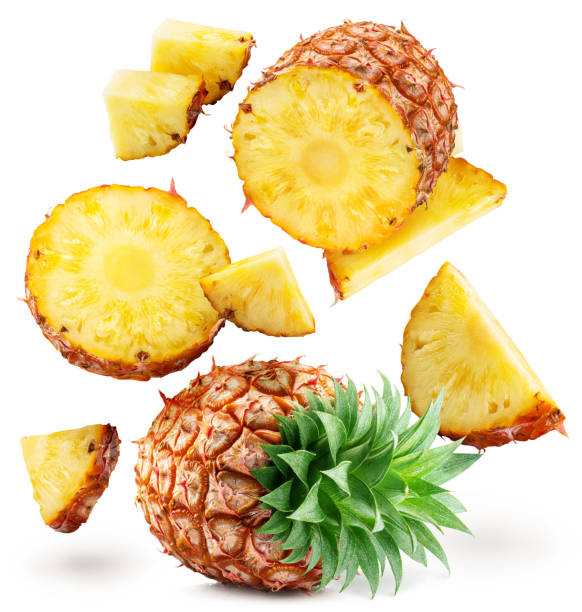 istock Ripe pineapple  and pineapple slices isolated on white background. File contains clipping path. 2092265622