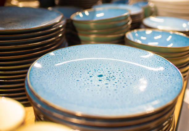 Ceramic blue tableware on the counter of the store, close-up