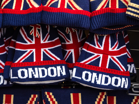 London, United Kingdom - February 26, 2024: Commemorative London and English flag woolen beanies