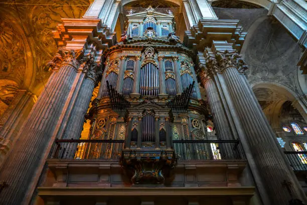 Ornate baroque style pipe organ in the Cathedral of Malaga Spain