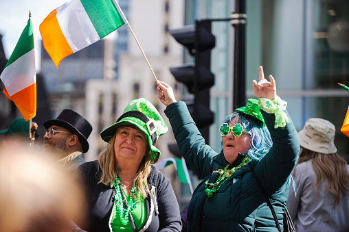 Montreal, Canada - March 18 2024： People celebrating the Saint Patrick`s Day Parade in Montreal downtown