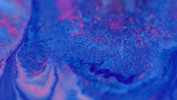 istock Glitter paint splash ink mix blue pink bokeh light 2092494908