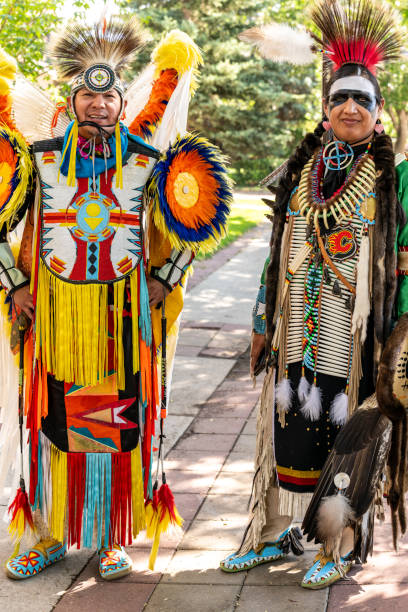 Okotoks, Alberta, Canada â July 22, 2023: Native American indigenous people dressed in traditional costumes for the powwow during a summer festival in Okotoks