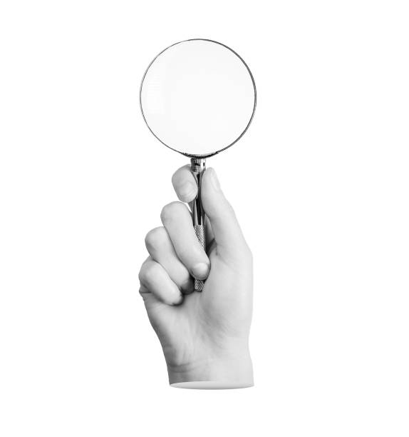 istock Hand holding magnifier, loupe, magnifying lens glass isolated on white background 2092623008