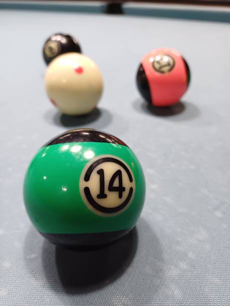 istock Pool balls on gray table sport game set known as eight ball pool. 2092680012