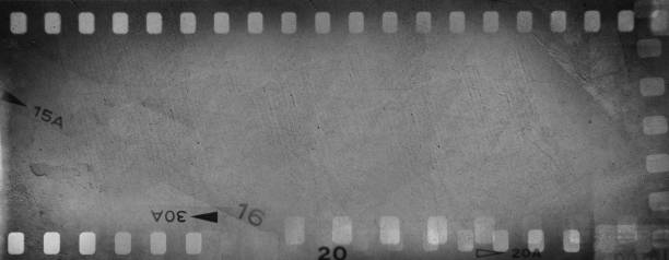 istock Film negatives grey background 2092734301