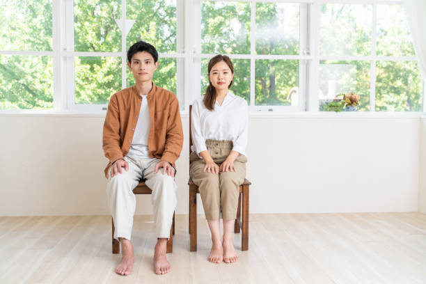 istock asian couple ,  straight face 2092761703
