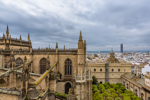 View of Seville Cityscape and Cathedral of Saint Mary of the See, the largest Gothic church in the world, in Seville, Andalusia, Spain