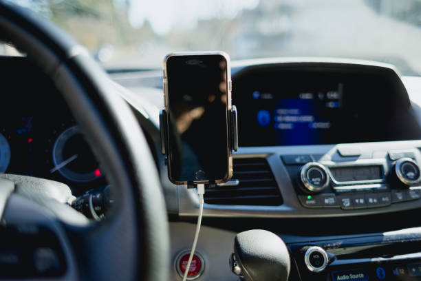 istock Smartphone in car mount holder 2092865684