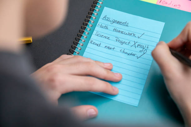 istock Middle school student uses supplies to do schoolwork 2092878608