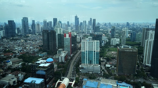 The Westin Jakarta, Jakarta, Indonesia View of the Jakarta Mass Rapid Transit from the hotel corner showing parts of the city of Jakarta from a height with tall buildings around it