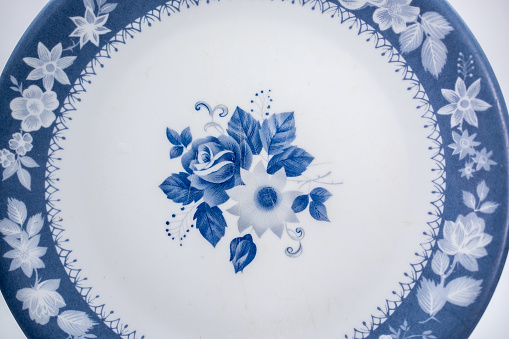 vintage cups and plates with blue and white flower pattern