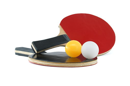 Pair of table tennis rackets and a table tennis balls isolated on white background, table tennis equipment