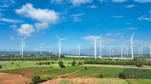 istock The wind turbines generating electricity with blue sky - Alternative renewable energy concept 2093072018