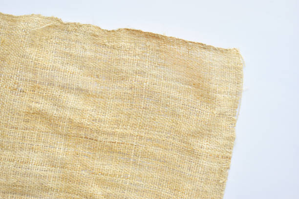 istock torn sackcloth isolated on white background, burlap fabric texture for design 2093112709