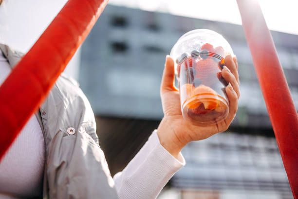 istock Healthy fruits in take away plastic cup 2093170771