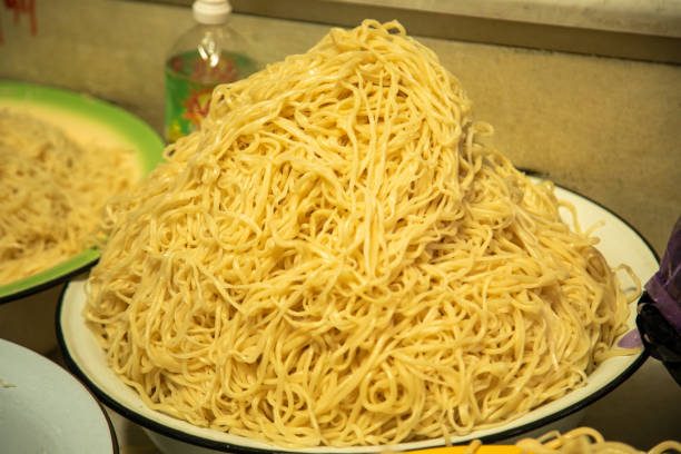 istock a noodles in a full bowl in market 2093180635