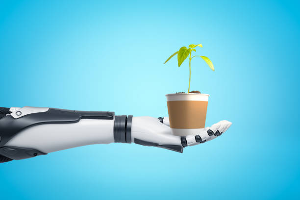 istock Robotic hand holding flower pot with new green sprout on blue background 2093221818