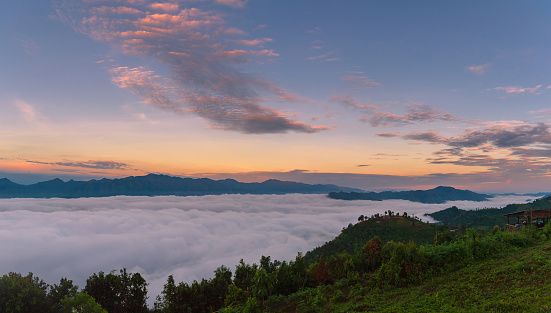 landscape and sky background concept, nature of north Thailand, fog-laden valleys, wintery mountain passes of Mae hong son province,  top view on the mountain sunrise and sunset