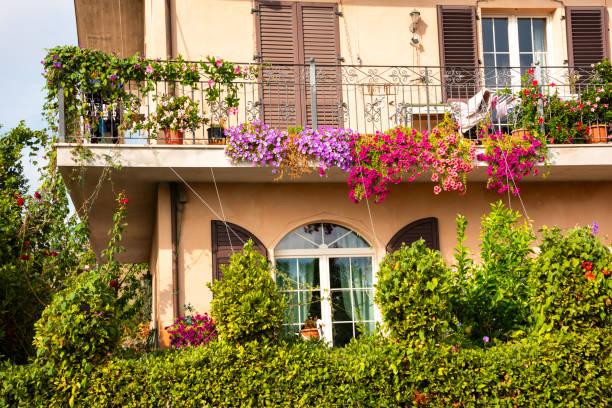 istock House balcony decorated with colorful flowers 2093292768